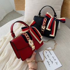 Trendy Fashionable Shoulder Crossbody handbag with Bright Colored Ribbon